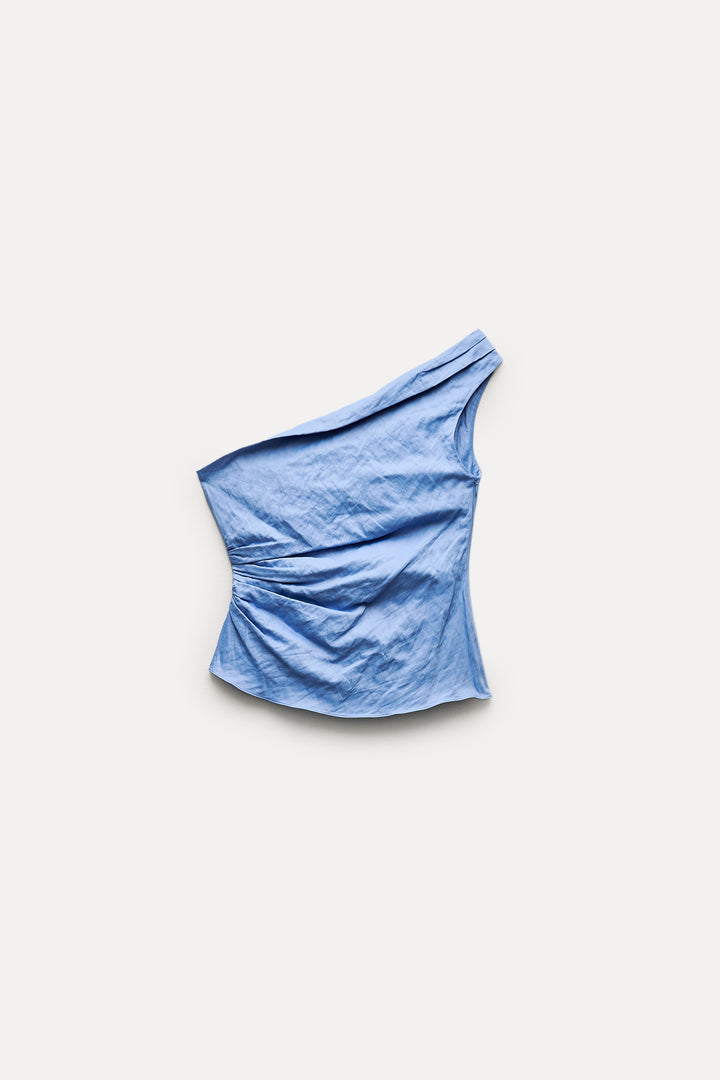 Top bleu drapé asymétrique