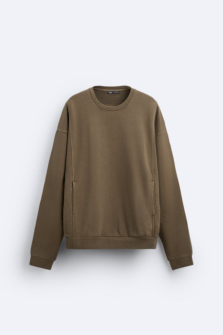 Sweat-shirt col rond manches longues lavé avec découpes zero fant février