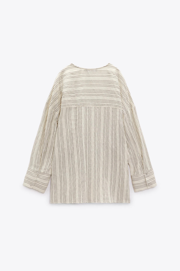 https://static.zara.net/photos/2023/V/0/1/p/3111/945/093/2/3111945093_6_2_1.jpg?ts=1679645977673